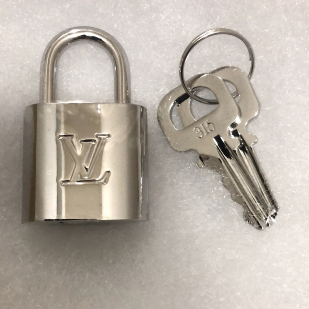 Authentic Louis Vuitton, lock and key set